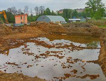 Откачка воды с участка Воронино